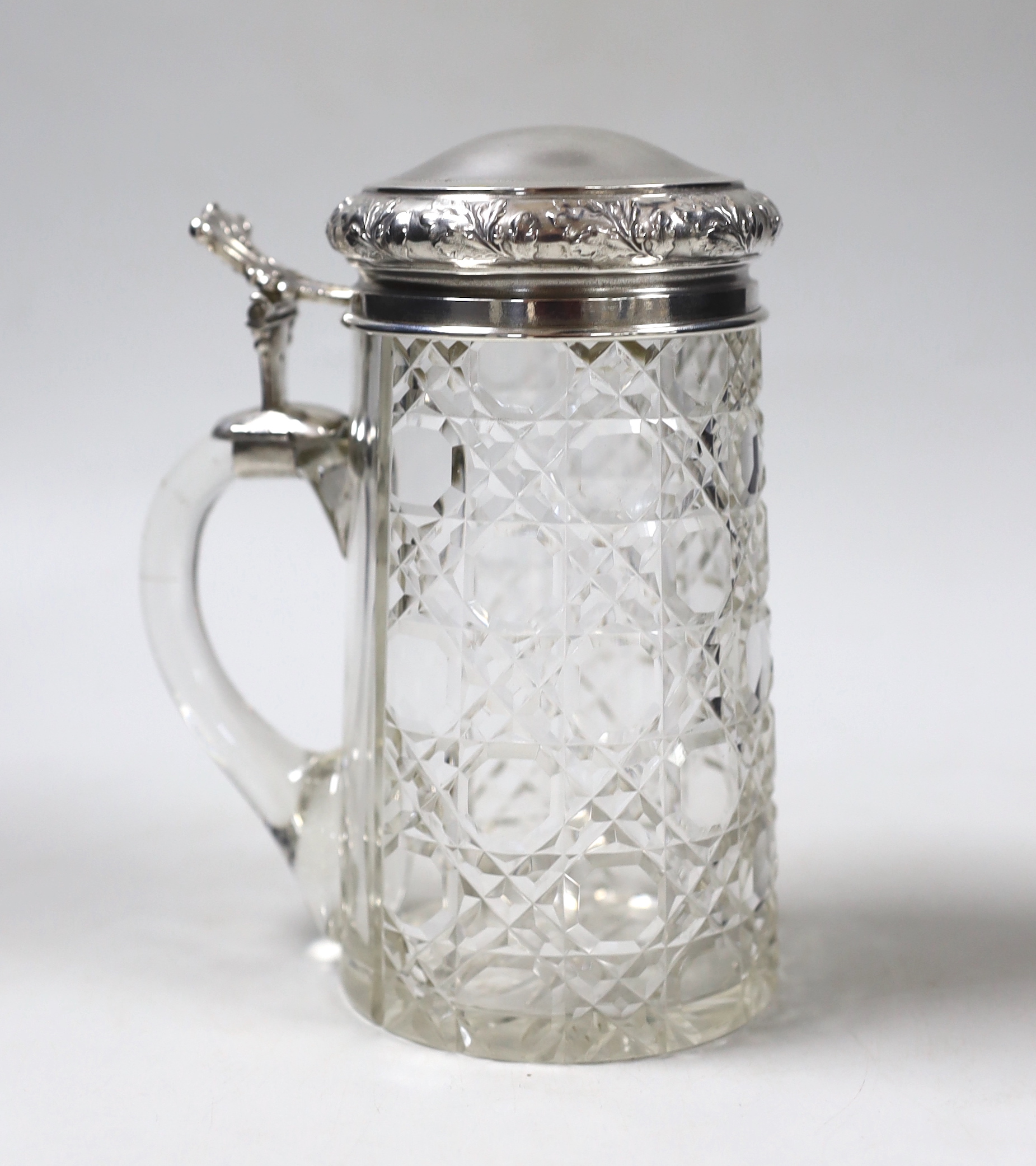 A German 800 standard white metal mounted cut glass stein, height 17.3cm.